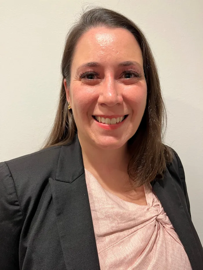Smiling woman in professional attire portrait