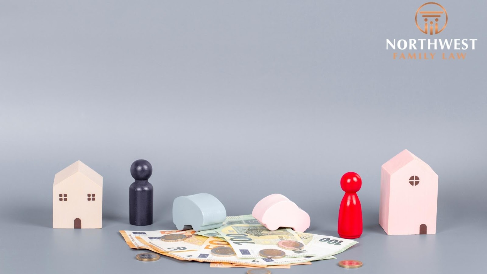 Wooden figures, houses, currency, Northwest Family Law logo.