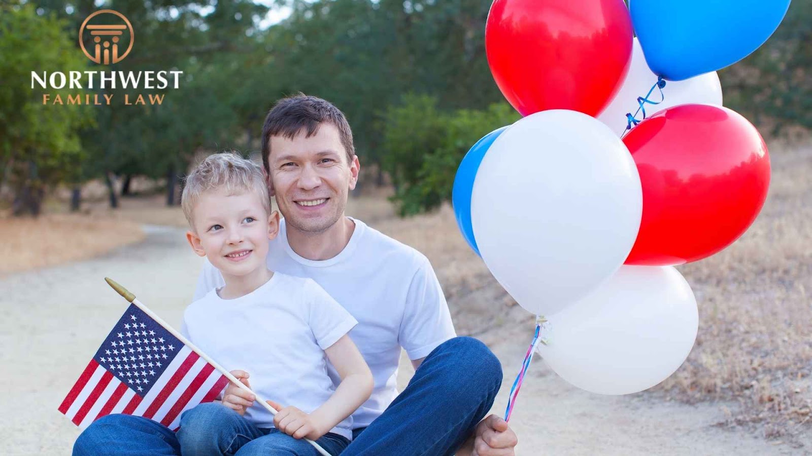 Father and son with balloons and USA flag.